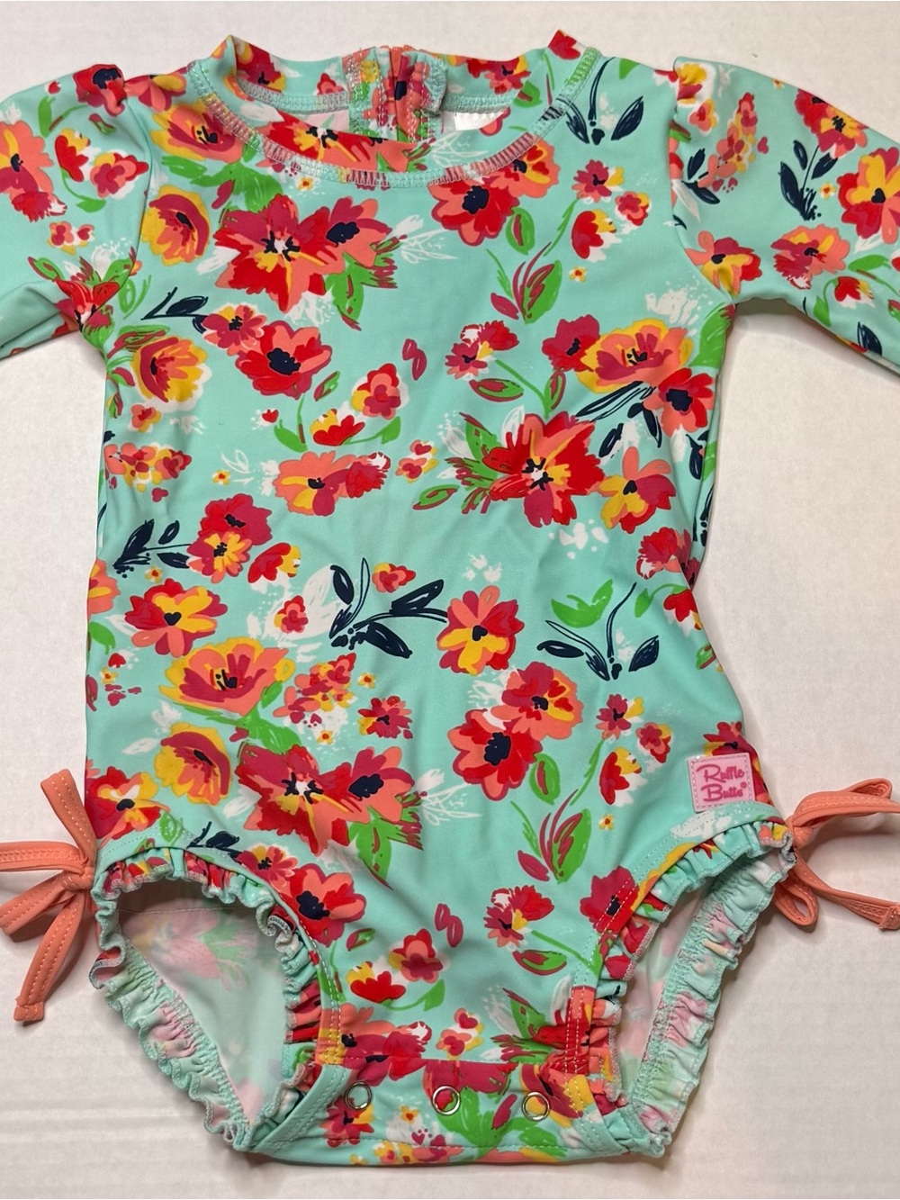 RuffleButts Floral Long Sleeve Rash Guard Swimsuit | 12-18 Months